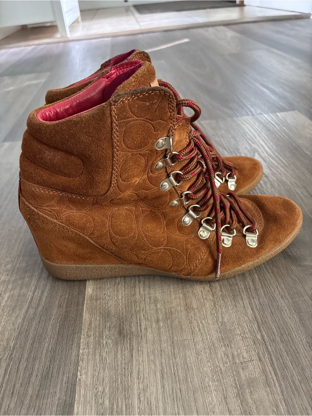 Coach Noelle wedge sneaker boots in a women's size 7.5